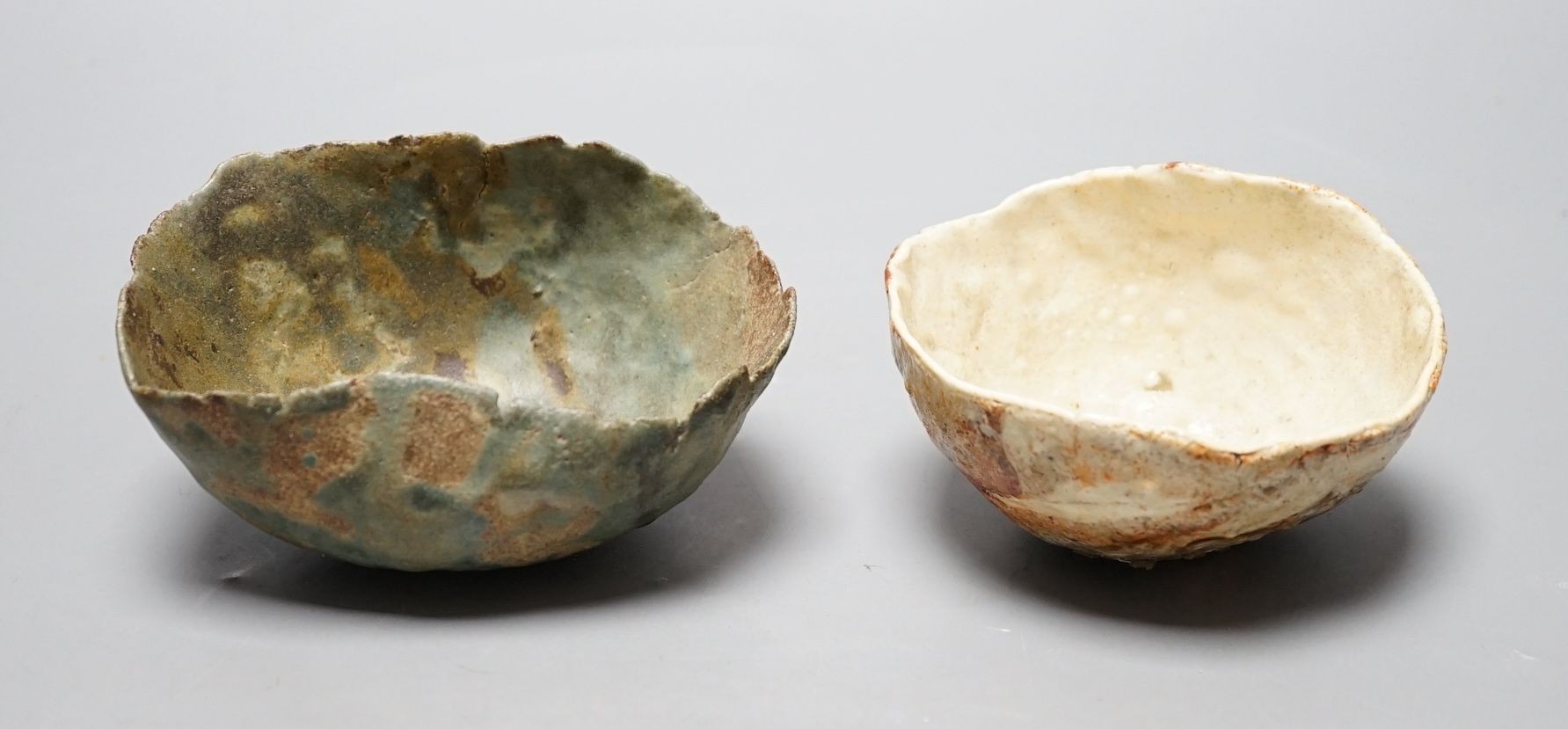 Ewen Henderson (1934-2000), two hand-built mixed laminated clay dishes, largest 12.5cm wide